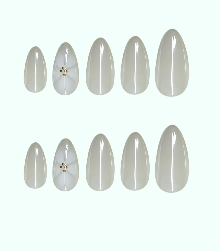 Set of white nail extensions on a white background