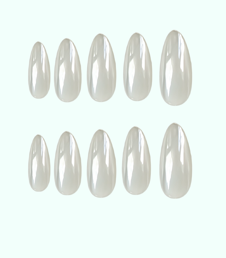 Set of white nail extensions on a white background