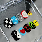 Set of colorful nail art designs in a clear case
