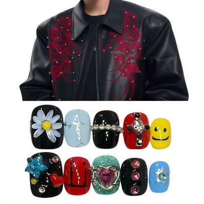 Black leather jacket with red floral embroidery and colorful nail art designs.