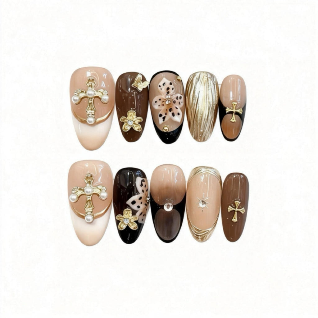 Set of decorative nails with crosses and pearls on a white background