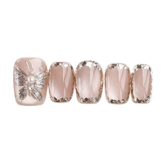 Set of five pink nail designs with decorative elements on a white background