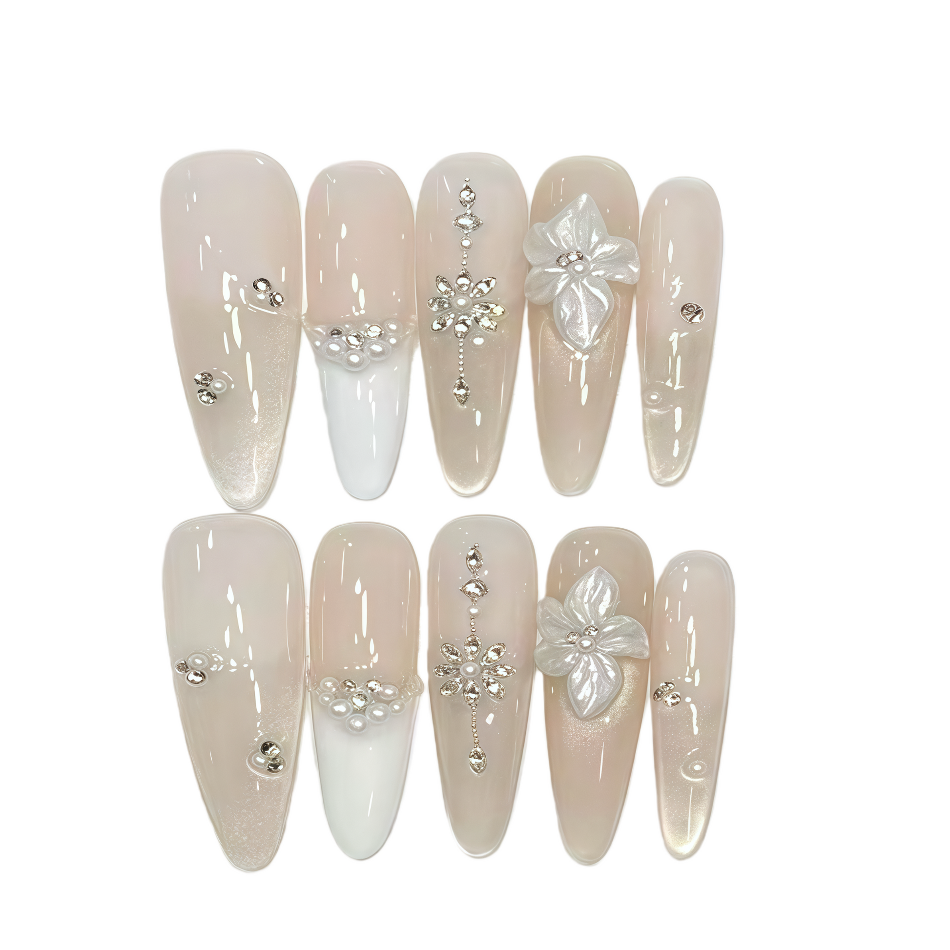 Set of decorative nails with flowers and rhinestones on a white background