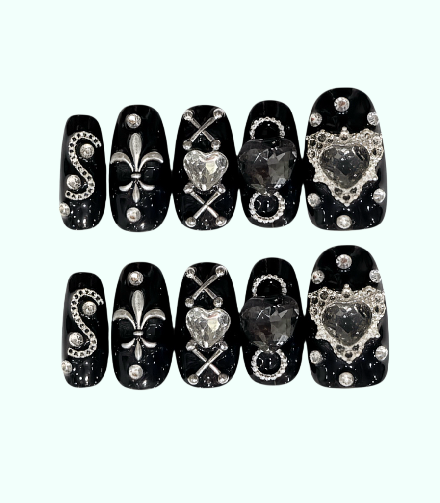 Decorative nail art stickers with various designs on a white background