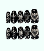 Decorative nail art stickers with various designs on a white background