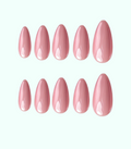 Set of pink nail polish samples on a white background