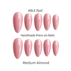 Set of pink press-on nails labeled 'ABLE Nail' with 'Medium Almond' description on a white background.