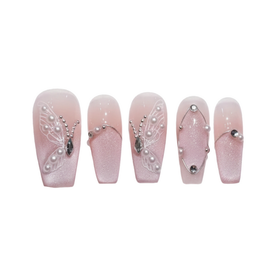 Set of pink nail art designs with decorative elements on a white background