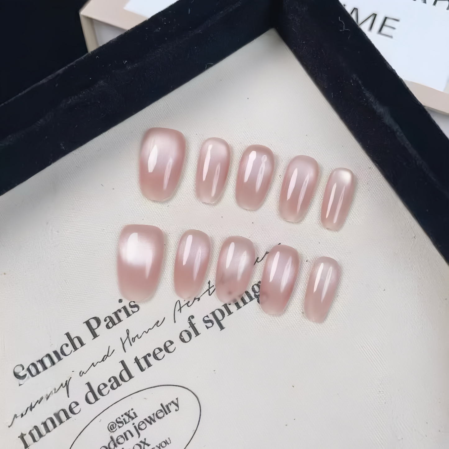 Set of pink nail polish samples on a white background with text
