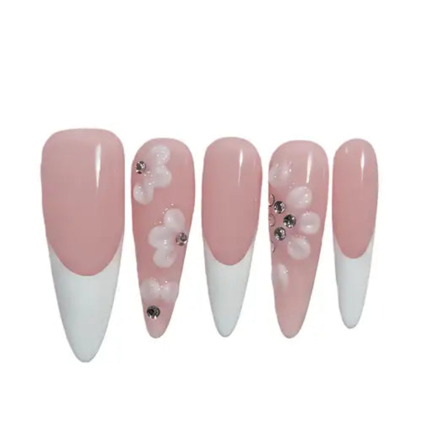 Set of long artificial nails with pink and white design on a white background