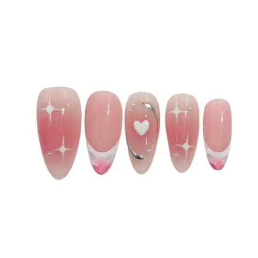 Set of pink nail art designs with stars and a heart on a white background