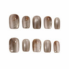 Set of brown nail polish samples on a white background