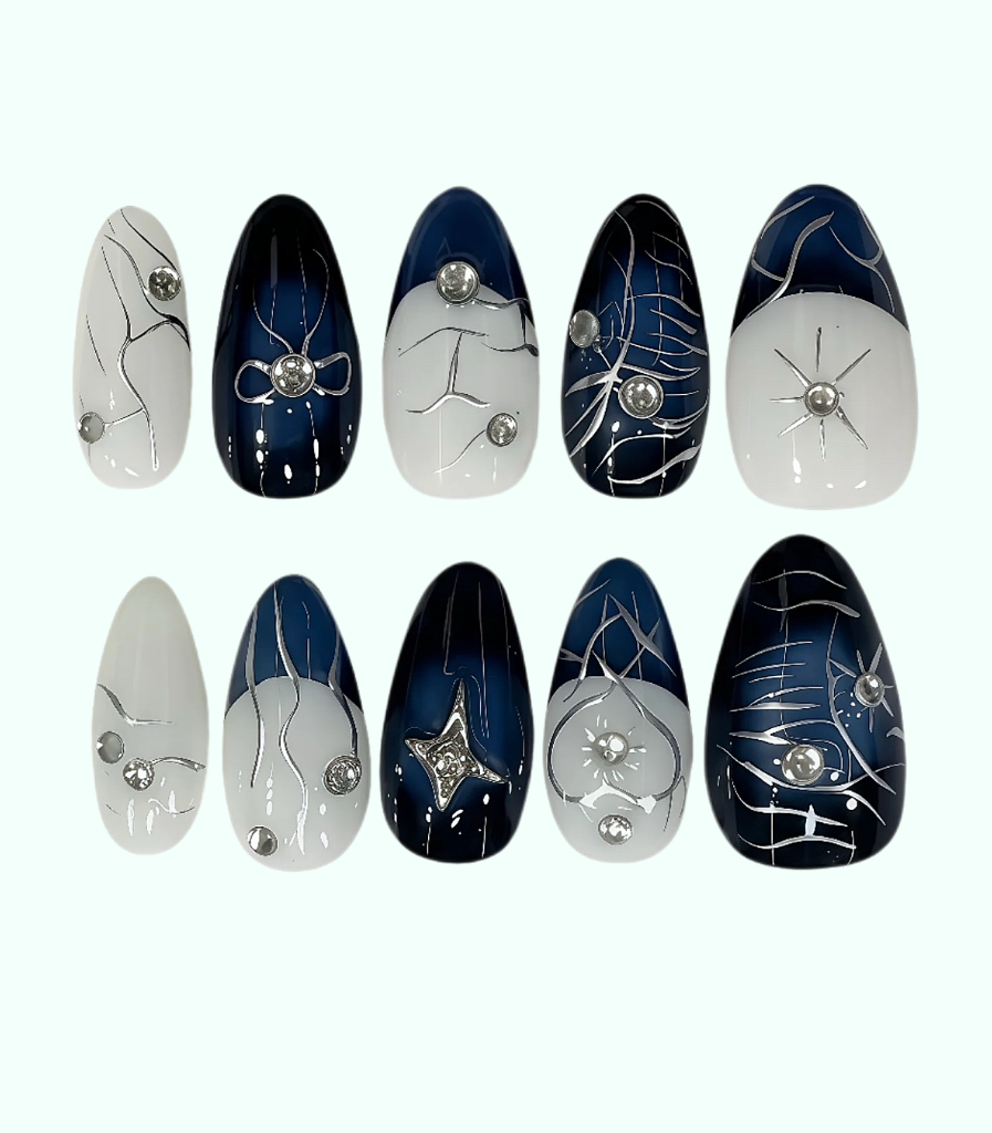 Set of nail art designs with decorative elements on a white background