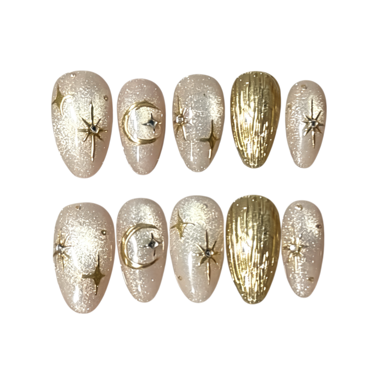 Set of decorative nails with gold and silver designs on a white background