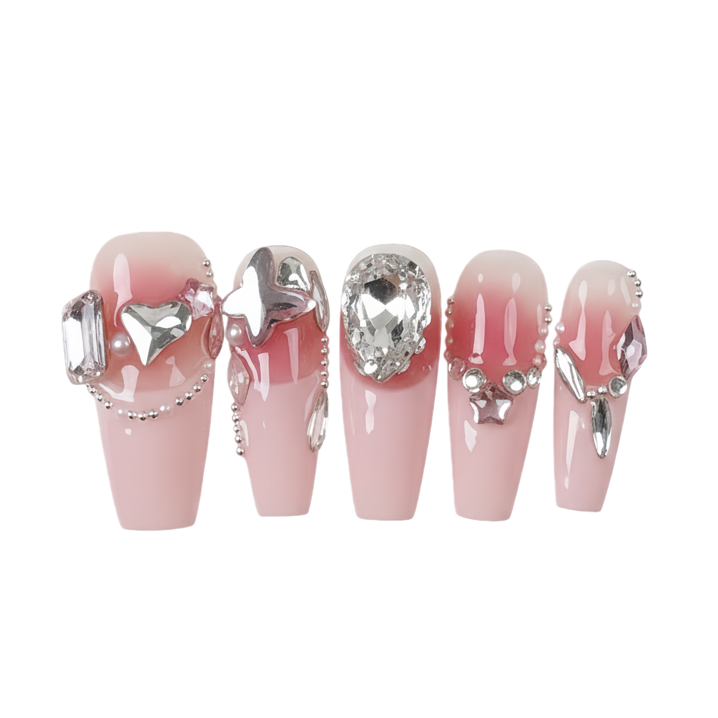 Set of pink nail extensions with decorative elements on a white background