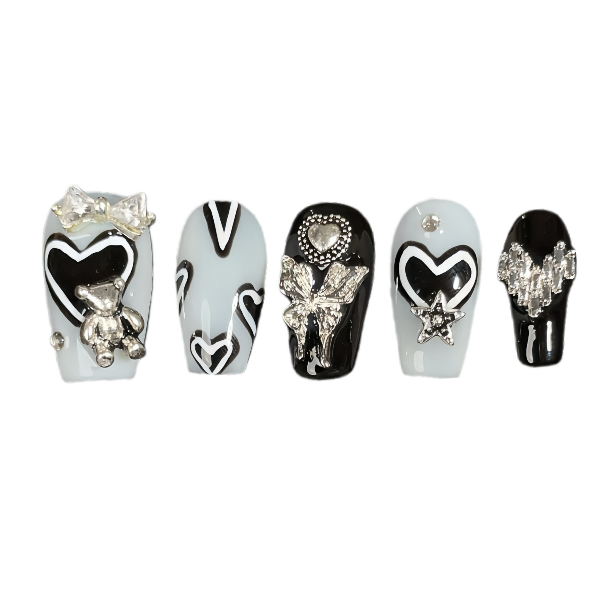 Set of decorative nail art designs with various embellishments on a white background