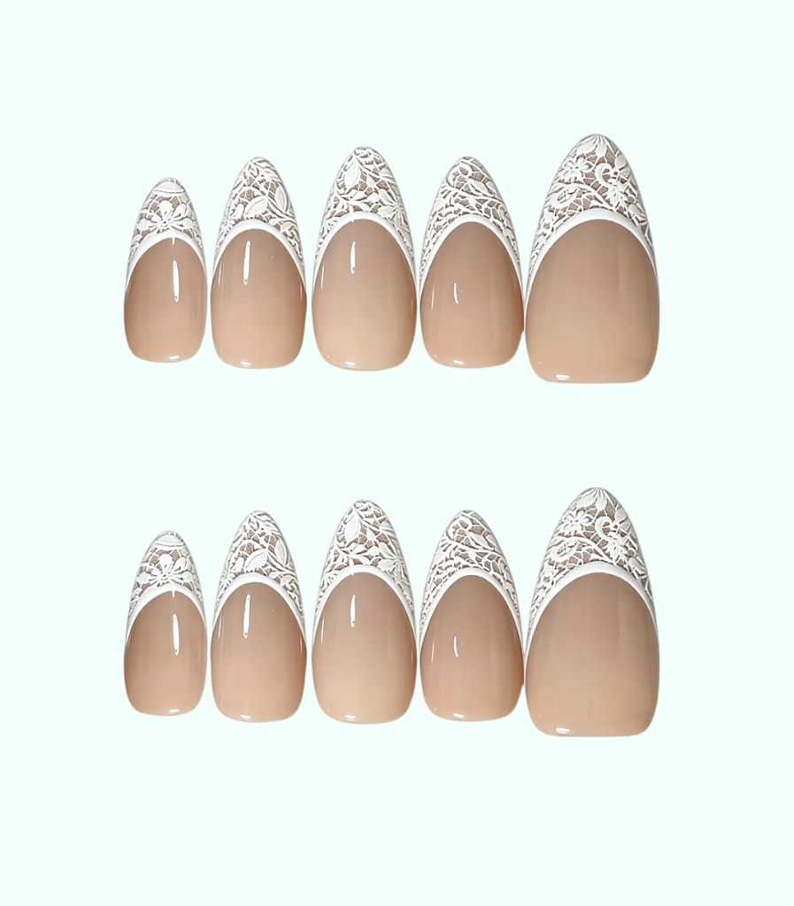 Set of beige nail stickers with decorative white tops on a white background