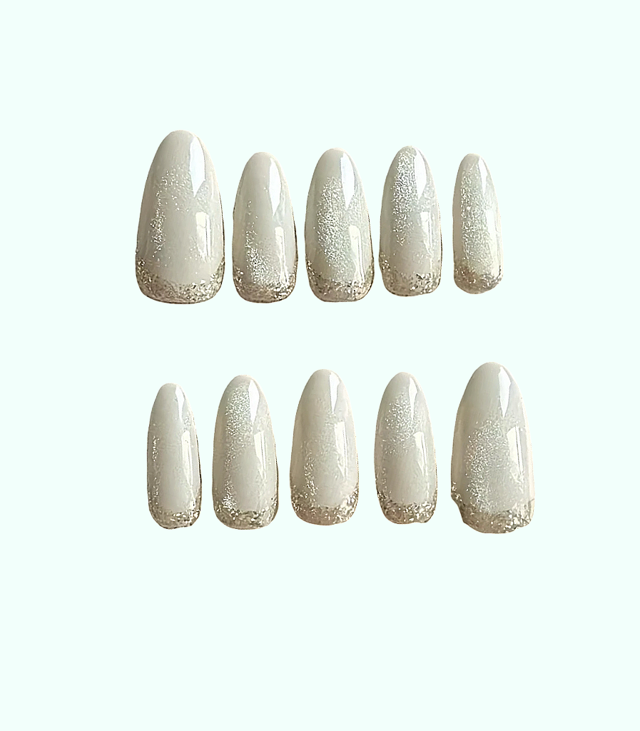 Set of decorative nails with a glittery finish on a white background