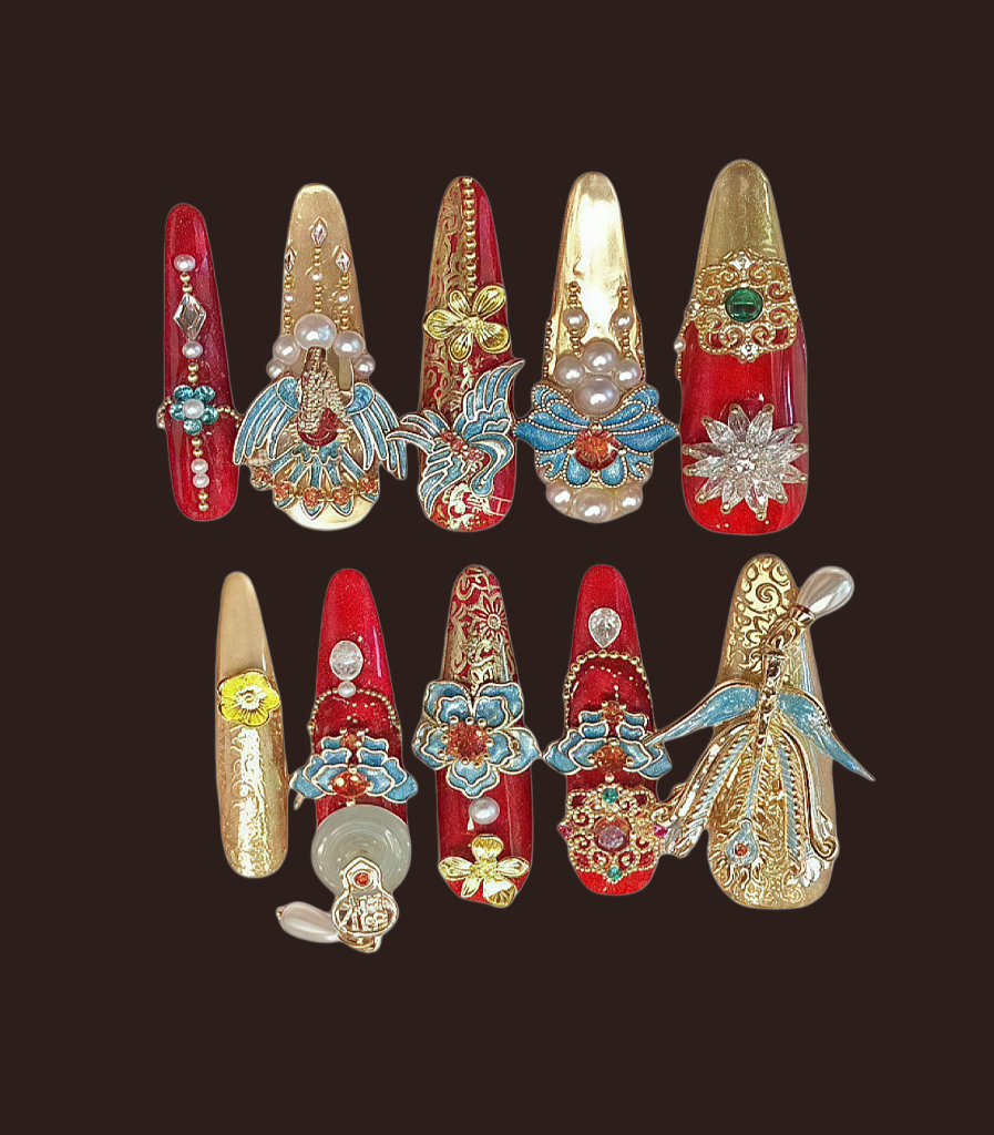 Decorative nail art designs with gemstones and pearls on a dark background