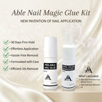 Able Nail Magic Glue Kit with two bottles on a beige background